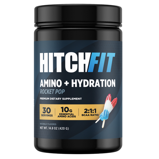 Hitch Fit Supplements Amino + Hydration recovery drink in Rocket Pop flavor, displaying red, white, and blue popsicle imagery and 2:1:1 BCAA ratio